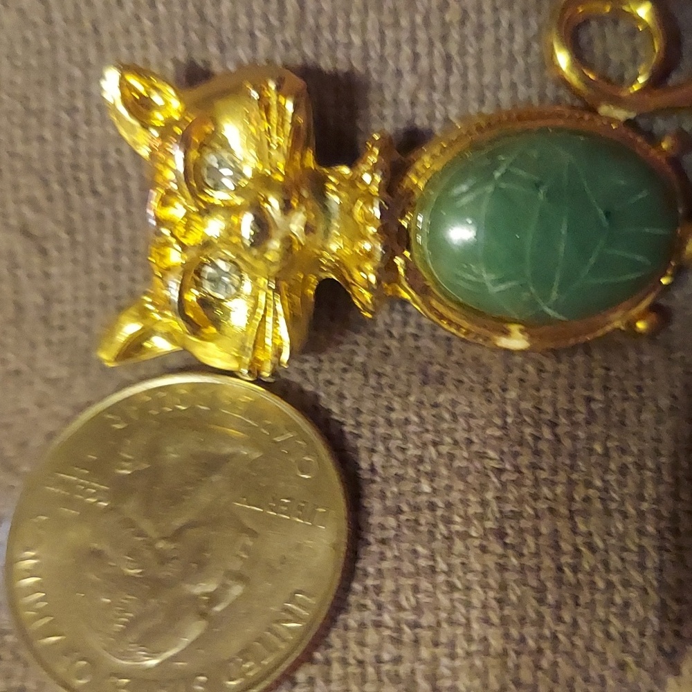 Vintage whimsical/ occult jewelry. Goldtone kitty. Rhinestone eyes. Eqypt beetle